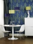 60's inspired drum shade pendants above table.