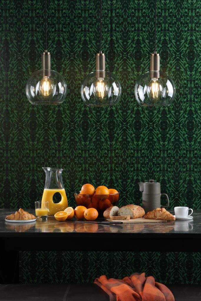 dining table with glass globe ceiling pendants