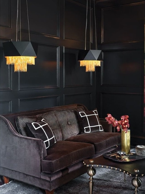 black art deco style lights above sofa