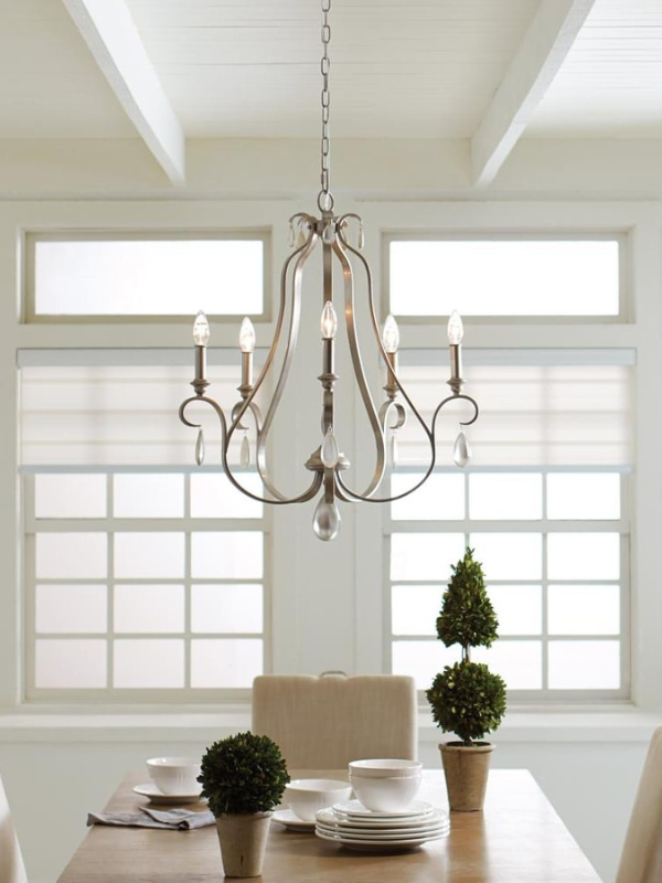 Regency style chandelier over dining table