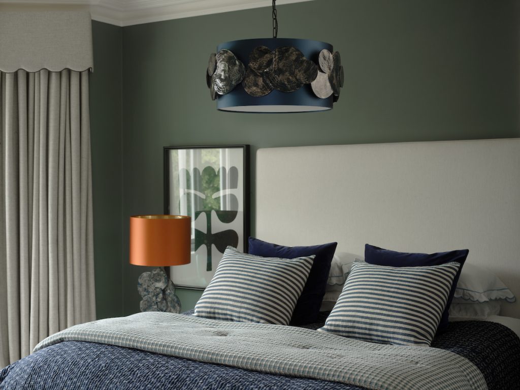 ceiling pendant with dark blue shade and planet detail