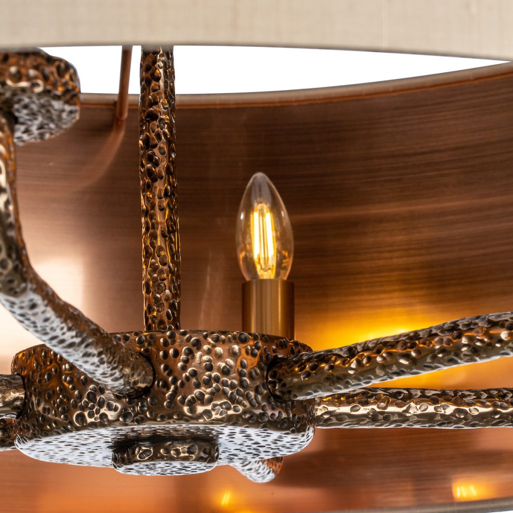 close up of hammered bronze ceiling pendant