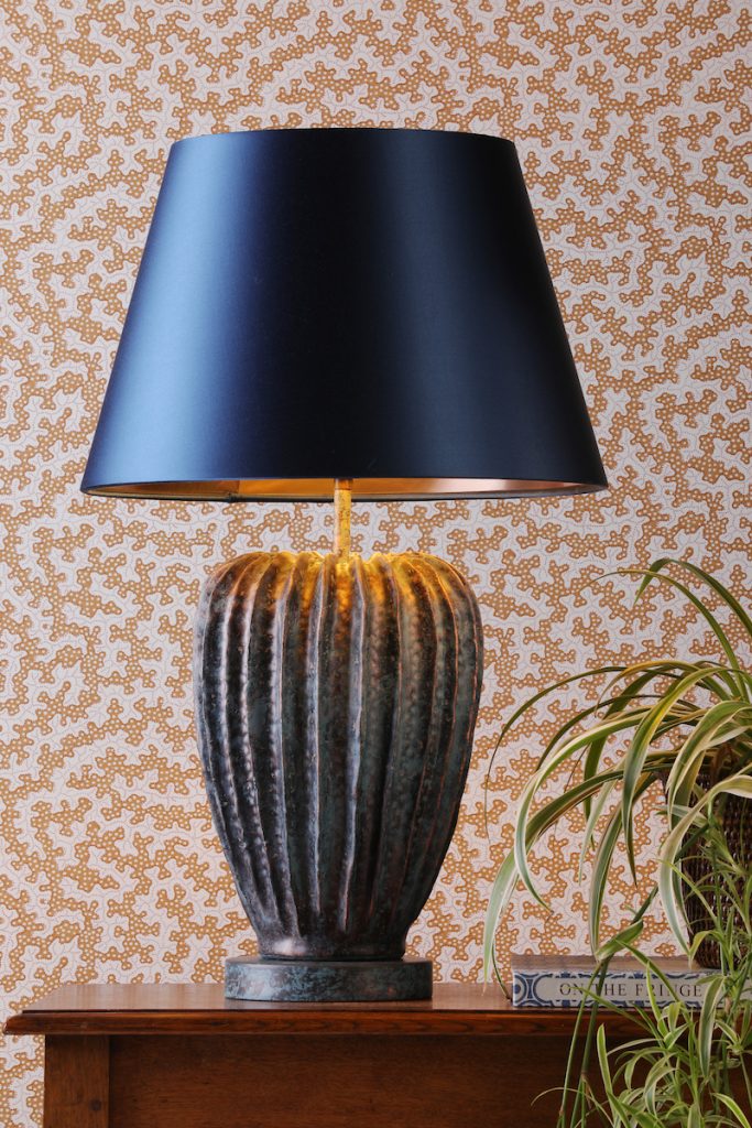 Verdigris table lamp with blue satin shade