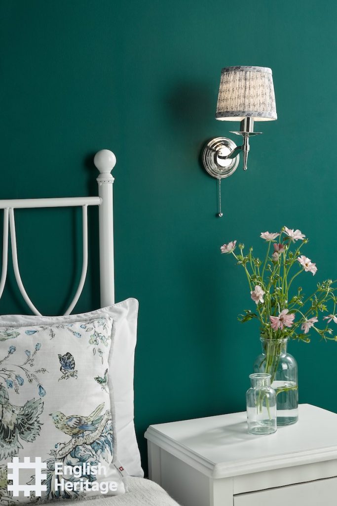switched nickel wall light with hand pleated patterned shade