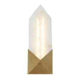 small LED wall sconce in a vintage brass finish with an alabaster shade
