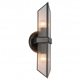 contemporary wall sconce in an urban bronze finish with ribbed glass panels