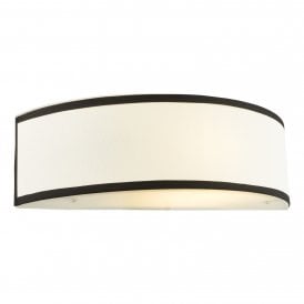 modern wall sconce with white lined shade and black trim
