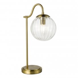 table lamp in antique brass finish with glass globe shade in clear segmented glass and candle bulb