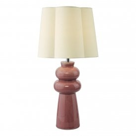 a pink ceramic lamp base with cream scalloped linen lamp shade 