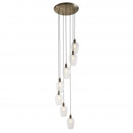 7 light antique brass and glass statement cascade pendant for stairwells 