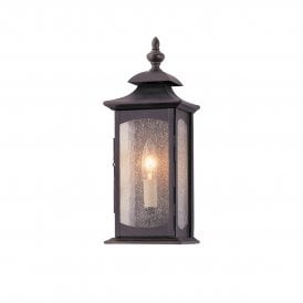 Small bronze outdoor wall lantern with seeded glass