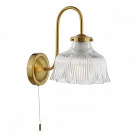 natural brass wall light with ribbed glass shade