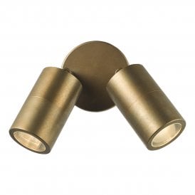 a modern, aged brass outdoor wall light featuring two spotlights 