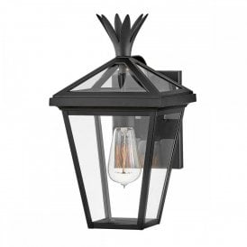 small black wall lantern with pineapple motif on top