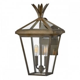 bronze two light wall lantern with pineapple motif at the top
