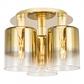 A modern gold and ombre glass flush ceiling light