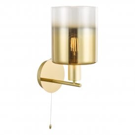 a modern wall sconce with gold ombre glass shade