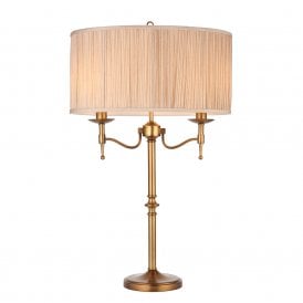 STANFORD aged brass candelabra table lamp with beige shade