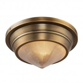 a modern vintage brass flush ceiling light with prismatic glass shade